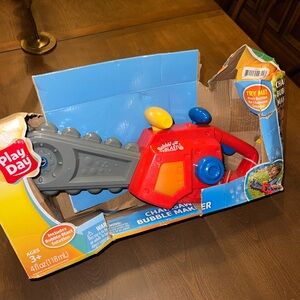 Red and Gray Chainsaw Bubble Maker